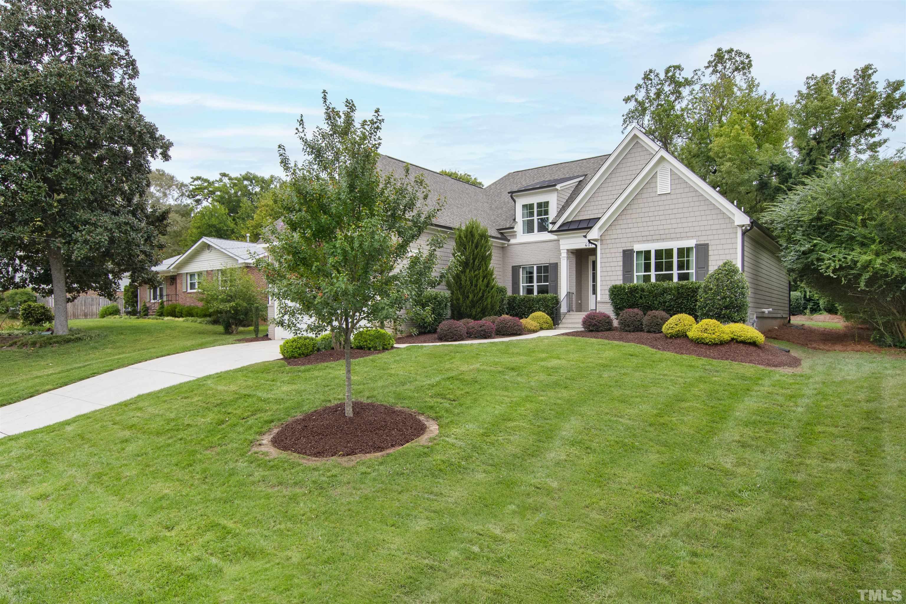 401 Latimer Road Raleigh, NC 27609 - Photo 2 of 45 a front view of house with yard and green space