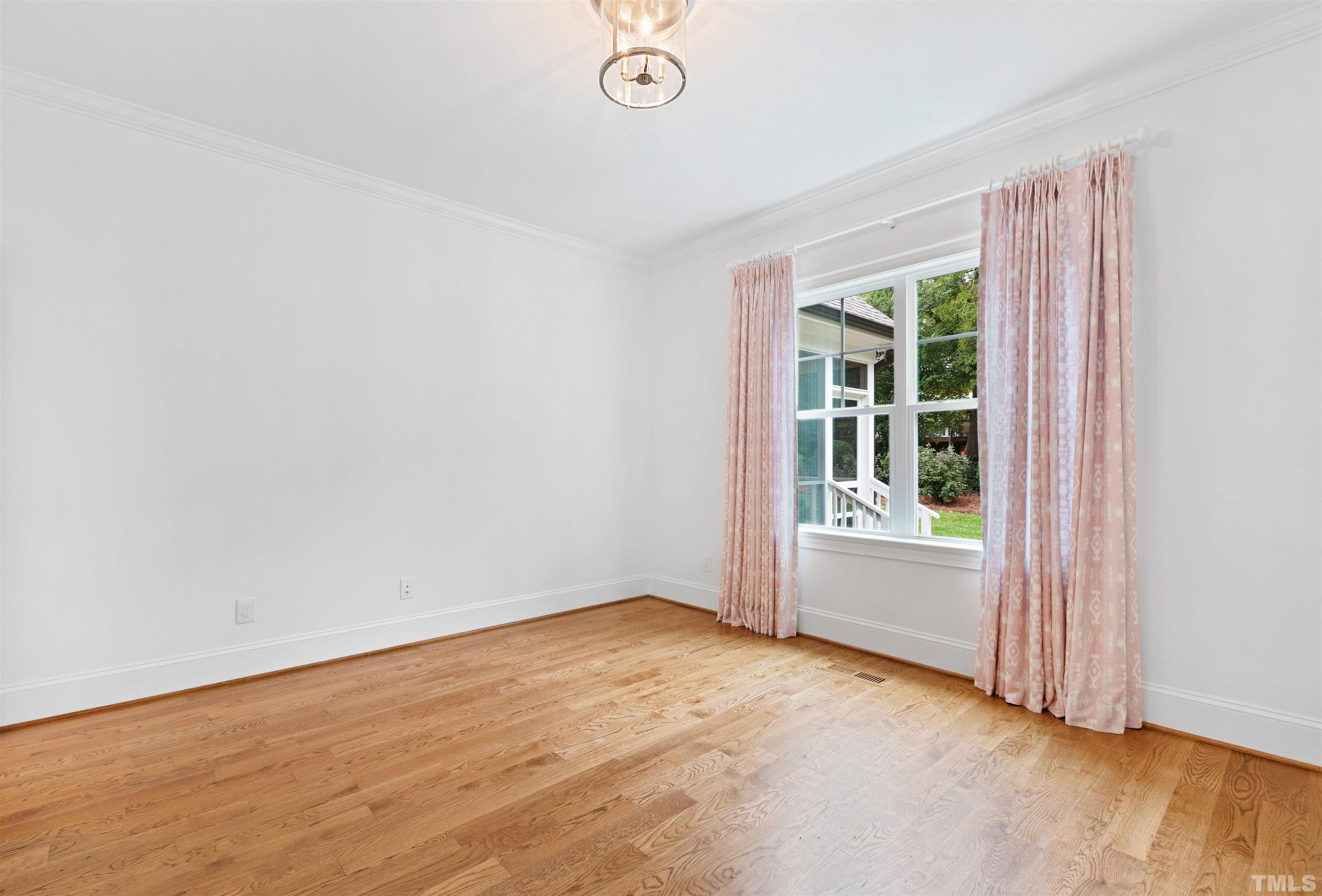 401 Latimer Road Raleigh, NC 27609 - Photo 27 of 45 an empty room with a window