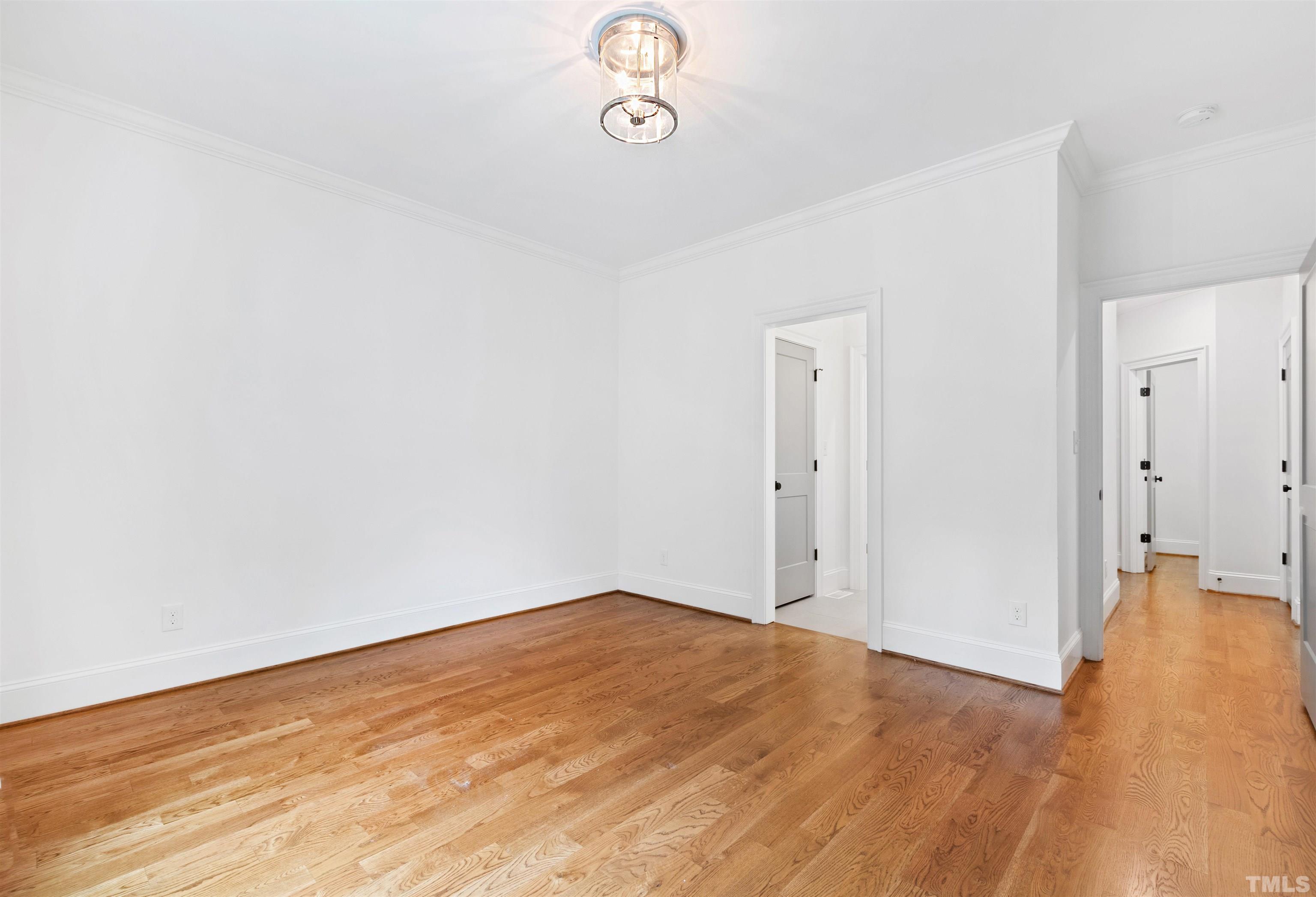 401 Latimer Road Raleigh, NC 27609 - Photo 31 of 45 a view of empty room with wooden floor