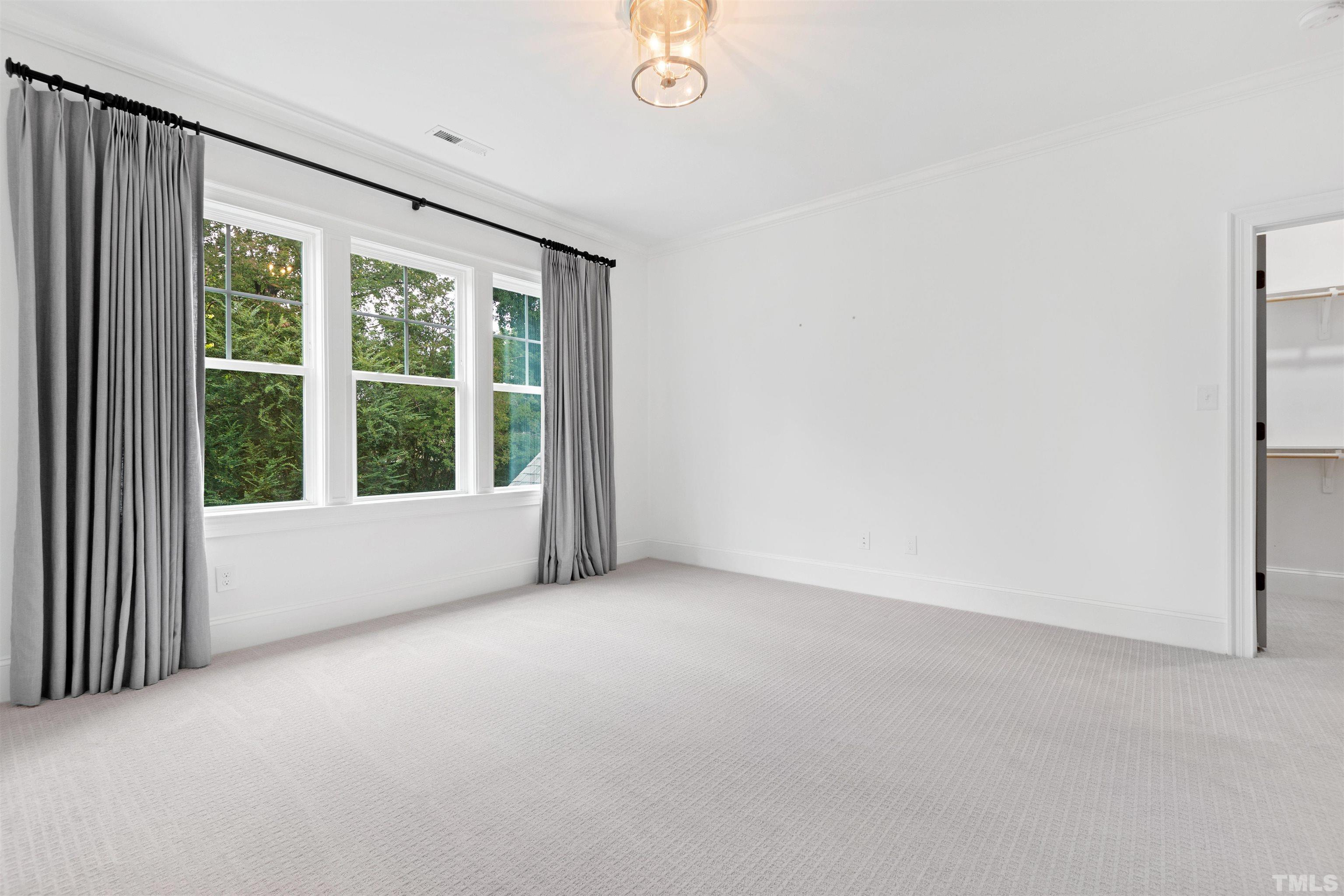 401 Latimer Road Raleigh, NC 27609 - Photo 38 of 45 a view of an empty room with a window