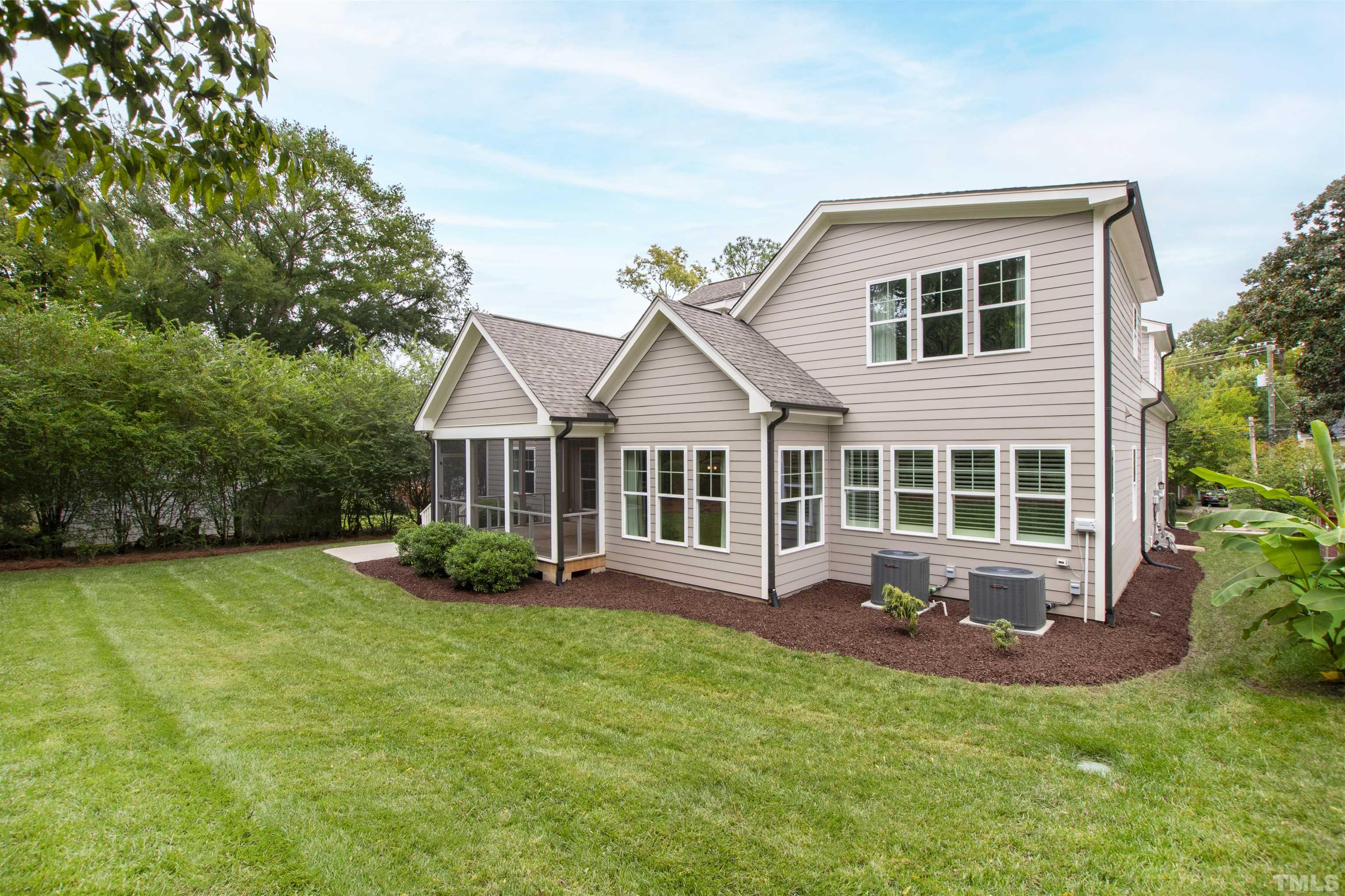 401 Latimer Road Raleigh, NC 27609 - Photo 40 of 45 a view of a house with a yard and sitting area