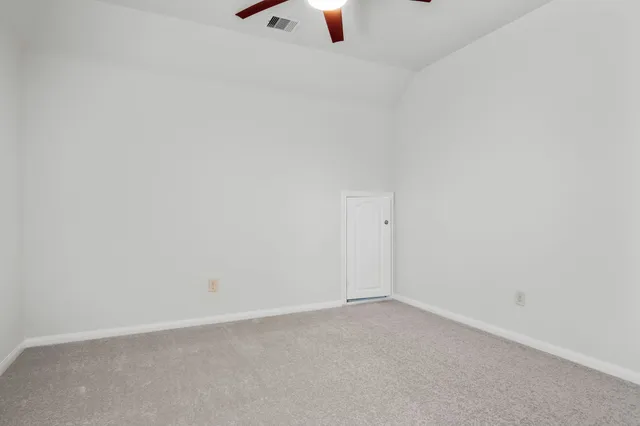 a view of a brick house with wooden floor
