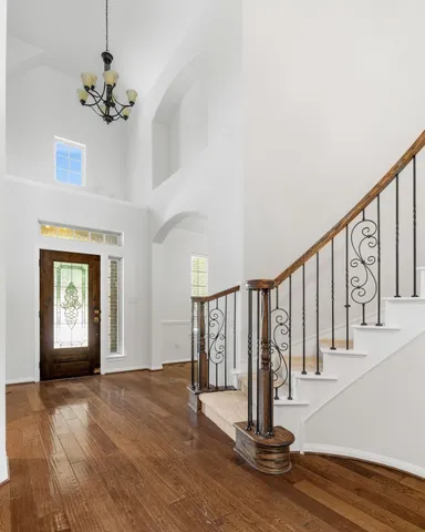 a view of entryway with wooden floor