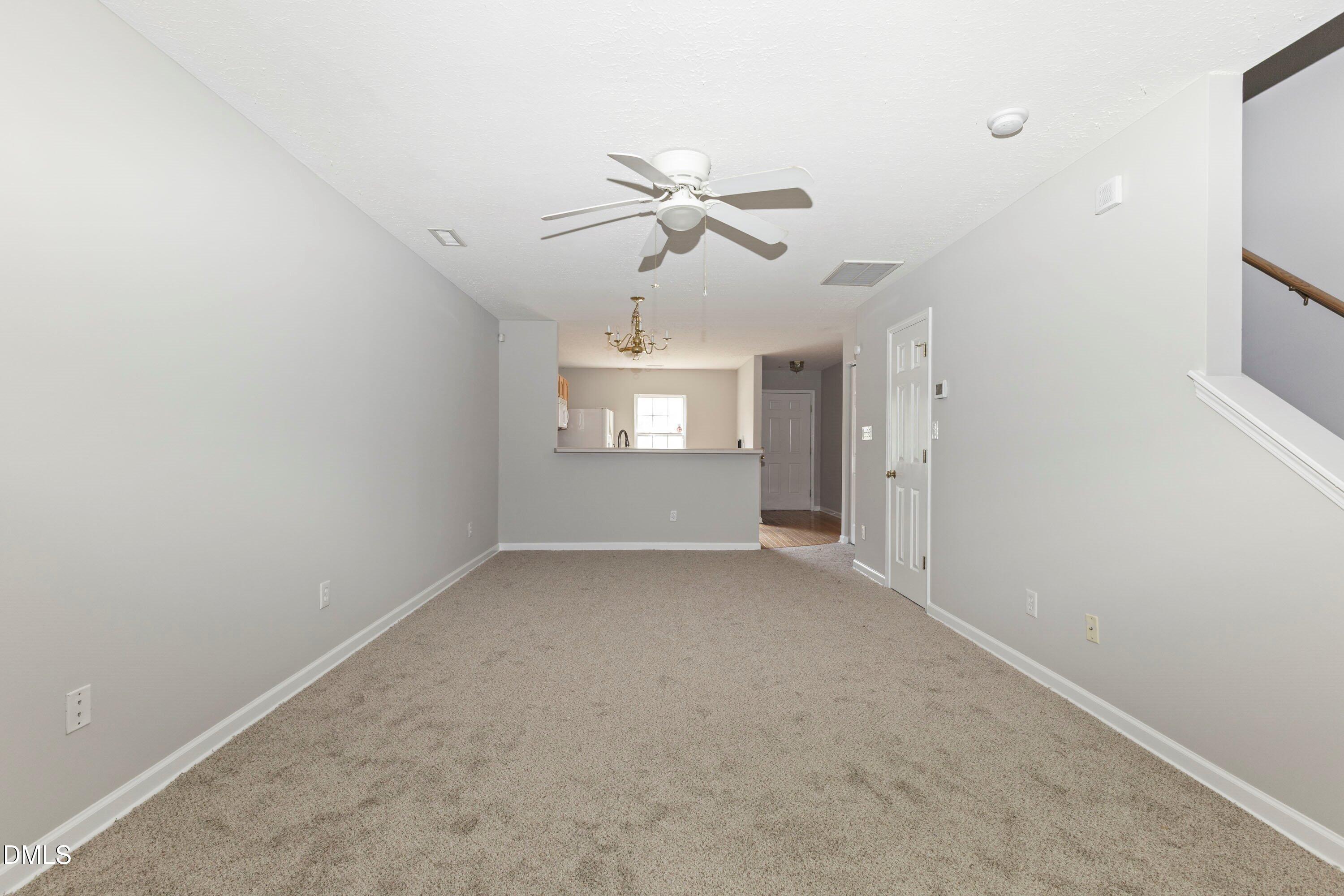 3358 Tarleton West Durham, NC 27713 - Photo 11 of 23 wooden floor in an empty room with a window