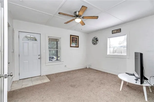 a kitchen with a sink cabinets and a stove
