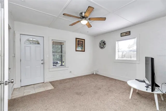 a kitchen with a sink cabinets and a stove
