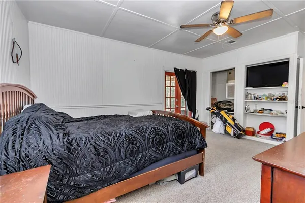 a front view of house and yard with seating space