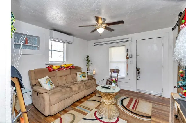 a view of a backyard with plants and lake view