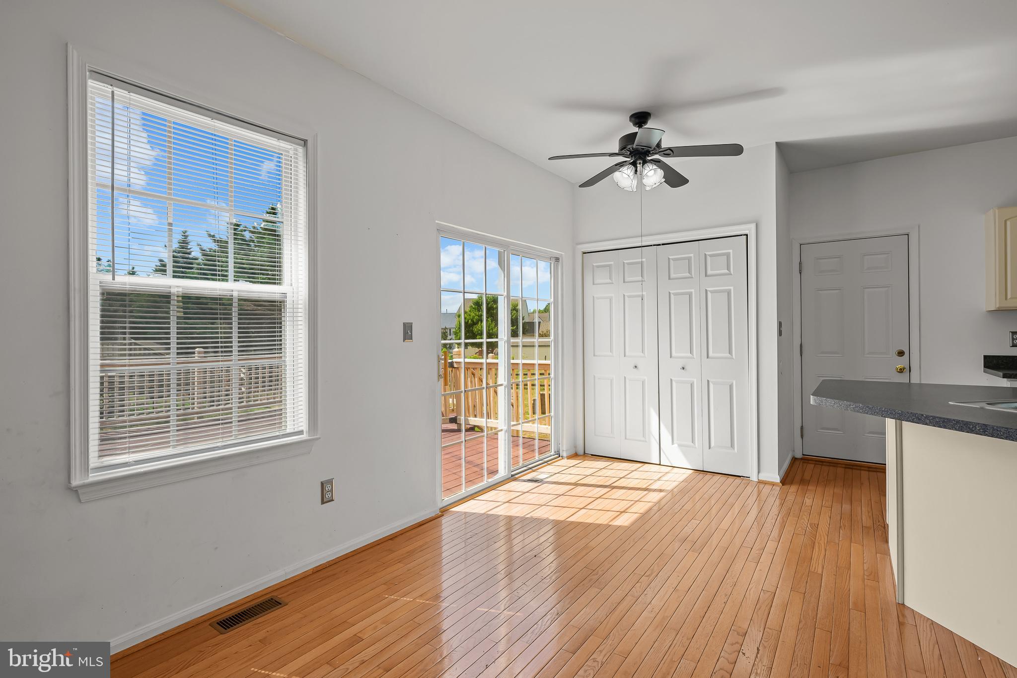 451 Carrington Drive Dover, DE 19904 - Photo 12 of 44 a view of a livingroom with wooden floor and a window