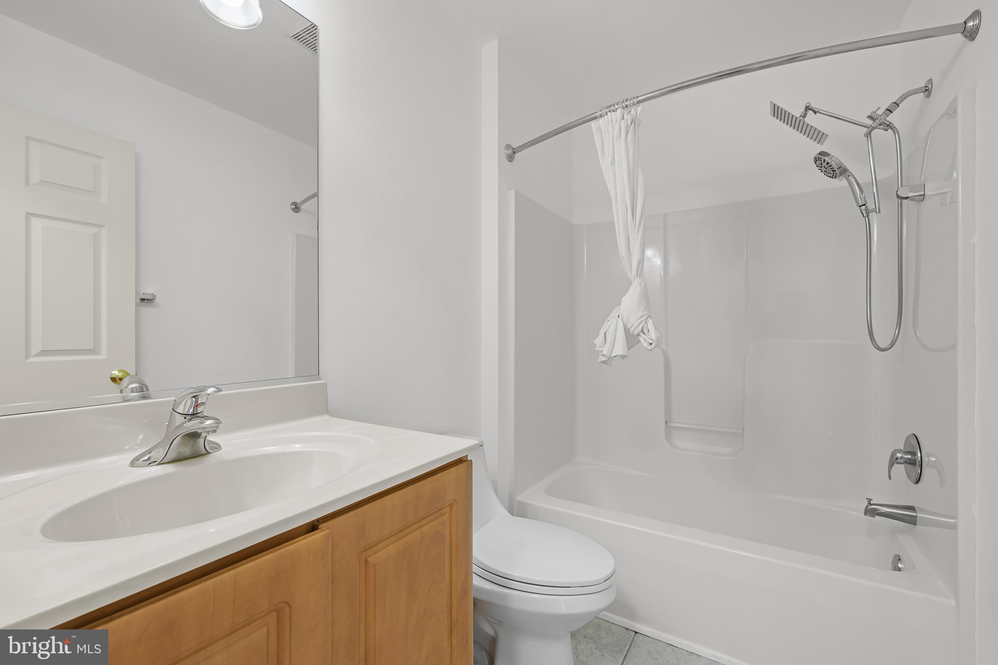 451 Carrington Drive Dover, DE 19904 - Photo 24 of 44 a bathroom with a sink toilet and shower