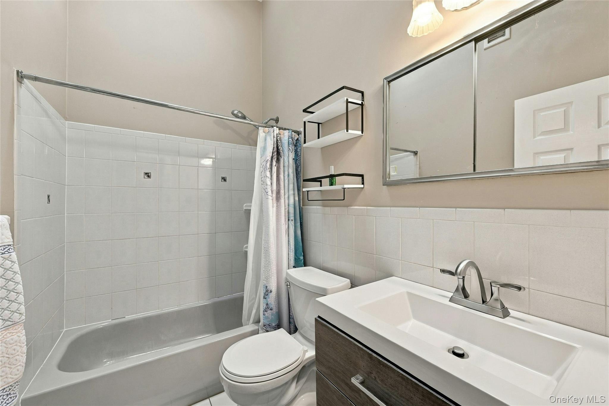 16 Georgann Road Manorville, NY 11949 - Photo 21 of 32 Full bathroom in hallway.
