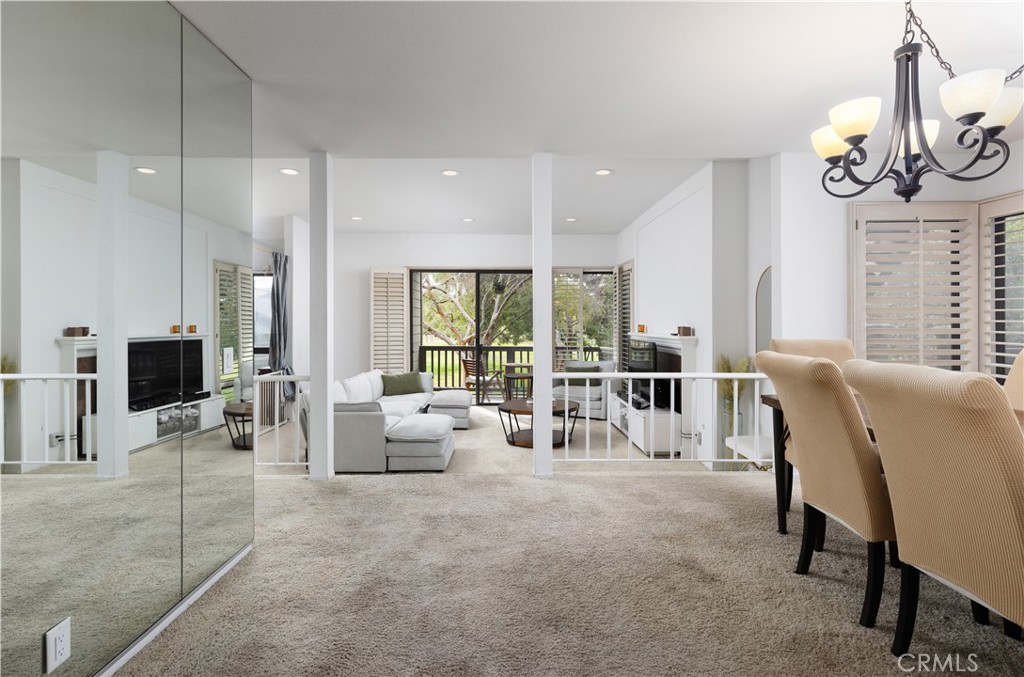 9 Flores Irvine, CA 92612 - Photo 15 of 38 a living room with furniture and a large window