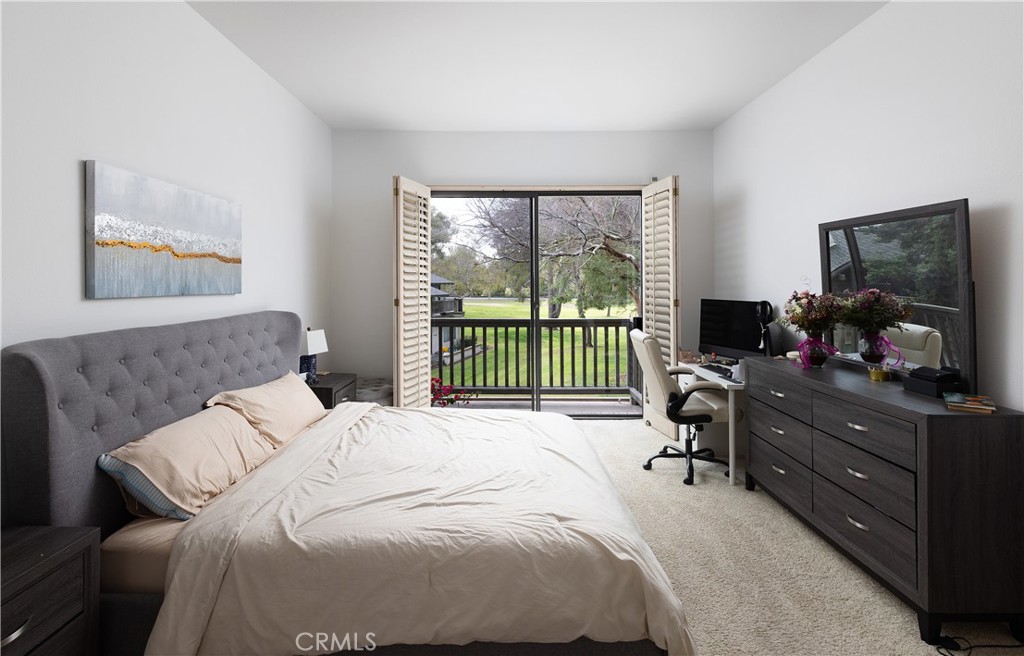 9 Flores Irvine, CA 92612 - Photo 20 of 38 a bedroom with a bed and a television