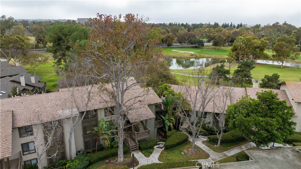 9 Flores Irvine, CA 92612 - Photo 2 of 38 an aerial view of a house with a yard and lake view