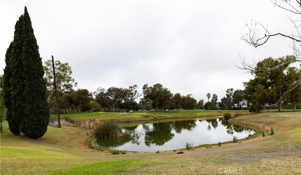 9 Flores Irvine, CA 92612 - Photo 5 of 38 a view of a lake with houses in background
