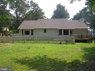 25022 Collins Wharf Road Eden, MD 21822 - Photo 2 of 10 a front view of a house with a yard