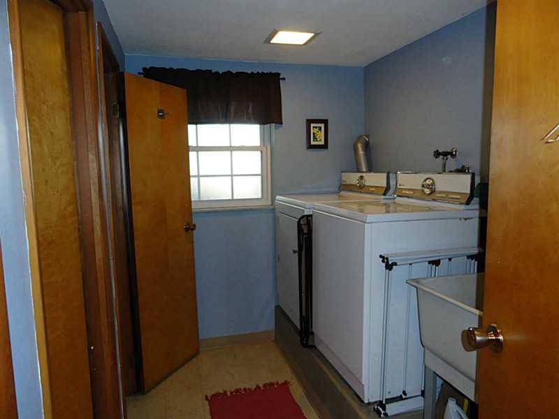 104 Kingsdale Road Churchill, PA 15221 - Photo 19 of 24 Other. Laundry room with washer and dryer and a laundry tub.