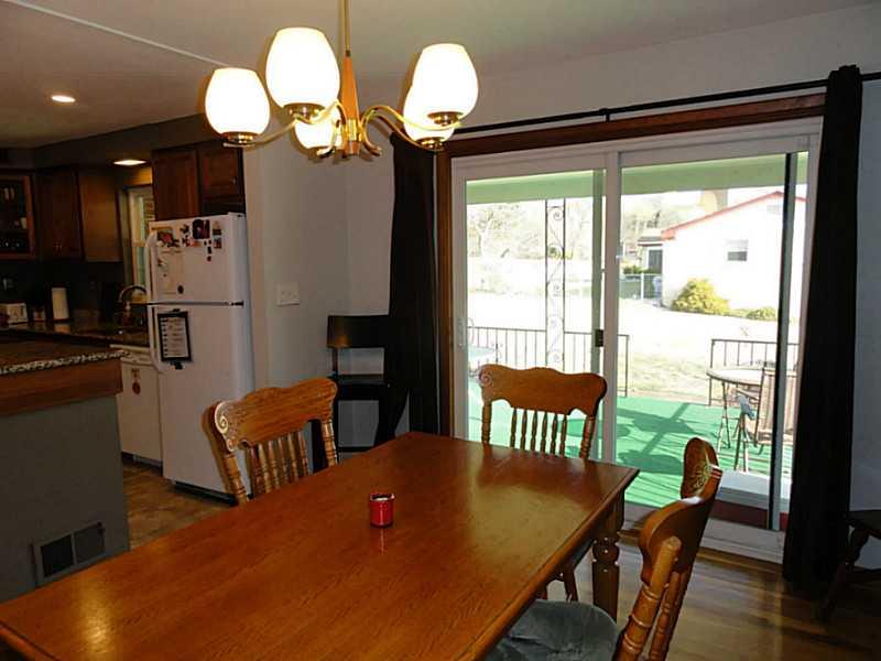 104 Kingsdale Road Churchill, PA 15221 - Photo 8 of 24 Dining Room. Newer sliding glass doors lead to the back patio.