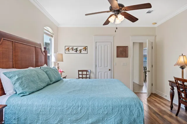 a bathroom with a granite countertop sink and a bathtub