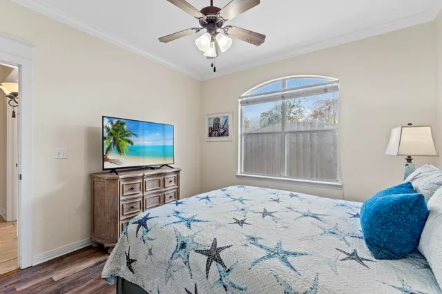 a bathroom with double vanity sinks a toilet and a mirror