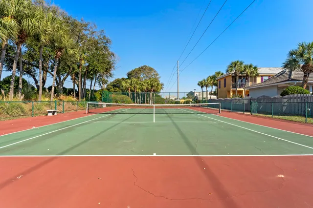 a sign board with parking space