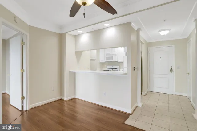 a kitchen with a sink and a large window