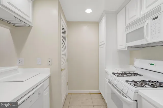 a room with furniture and a rug