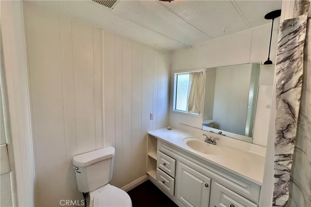 3825 Valley Walnut Ca, Unit 46 Walnut, CA 91789 - Photo 11 of 17 a bathroom with a sink toilet vanity and tub