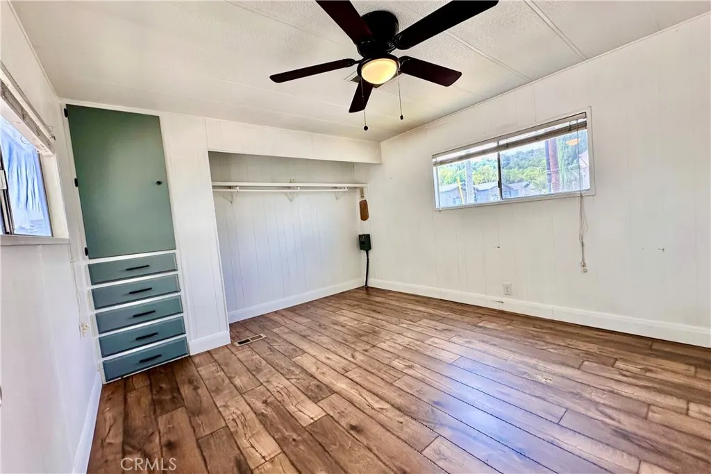 3825 Valley Walnut Ca, Unit 46 Walnut, CA 91789 - Photo 9 of 17 a view of empty room with wooden floor
