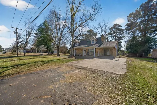 a house with trees in front of it