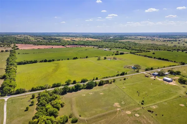 a view of an ocean and city