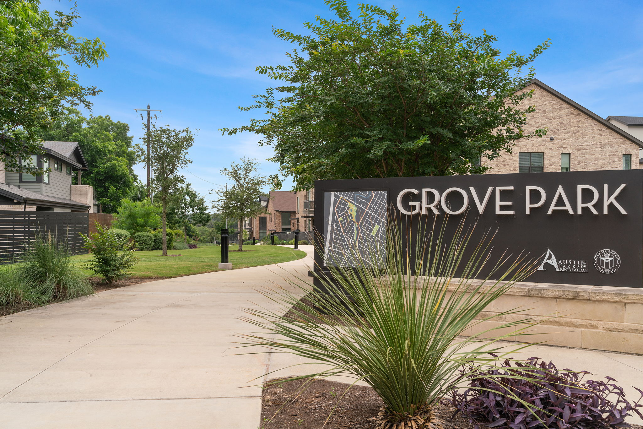 4501 Jackson Avenue, Unit 5205 Austin, TX 78731 - Photo 30 of 40 Community sign featuring a yard