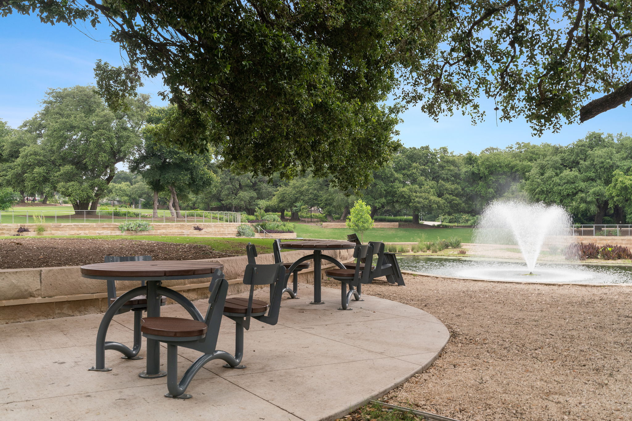 4501 Jackson Avenue, Unit 5205 Austin, TX 78731 - Photo 38 of 40 View of community featuring a patio and view of scattered trees