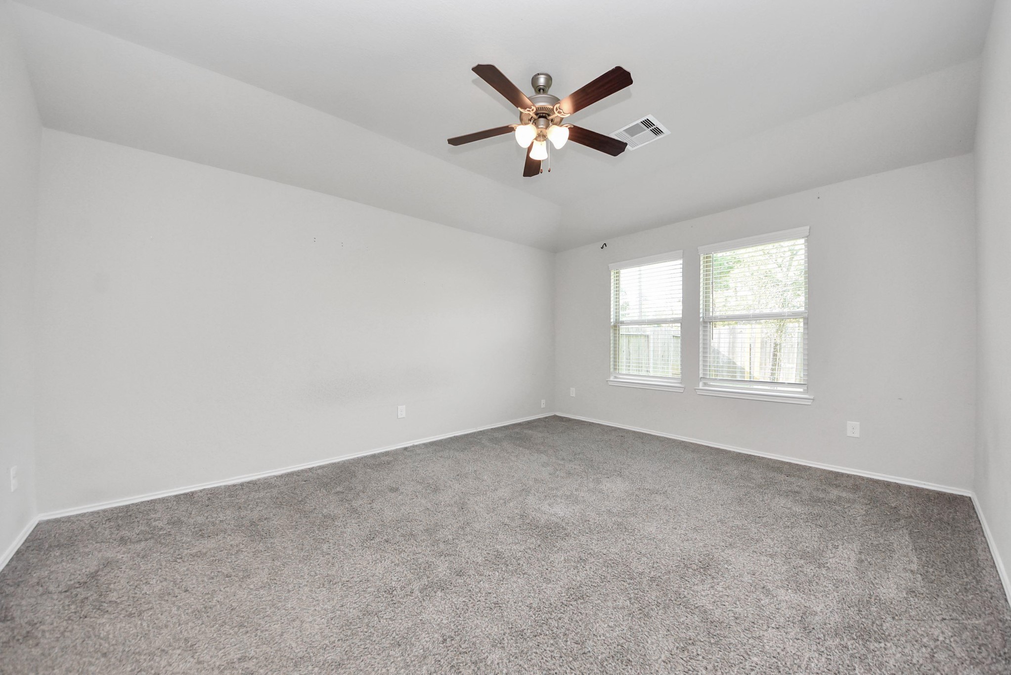 3305 Jagged Crow Lane Conroe, TX 77301 - Photo 14 of 30 a view of an empty room with a window