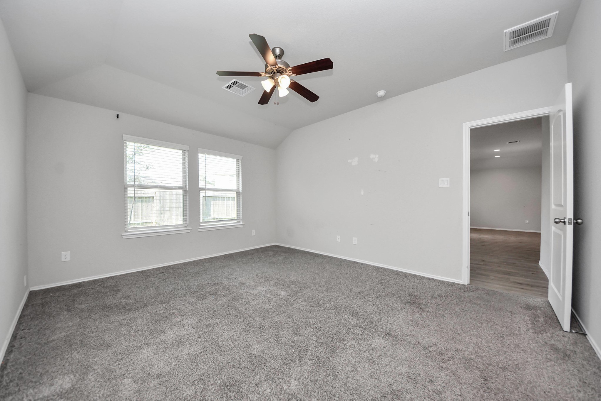 3305 Jagged Crow Lane Conroe, TX 77301 - Photo 15 of 30 a view of an empty room with a window