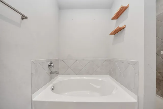 a close up of a bathtub