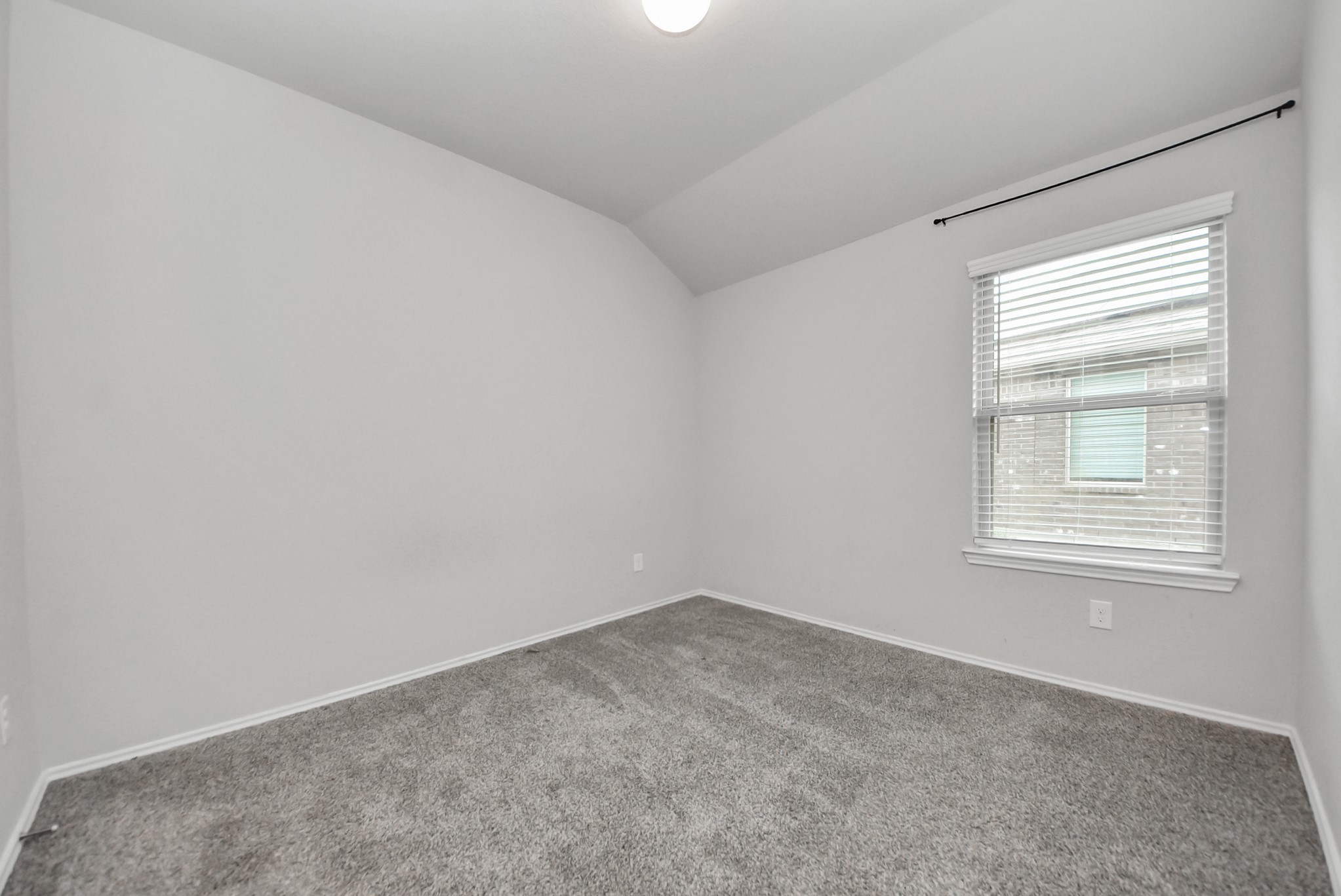3305 Jagged Crow Lane Conroe, TX 77301 - Photo 20 of 30 an empty room with a window