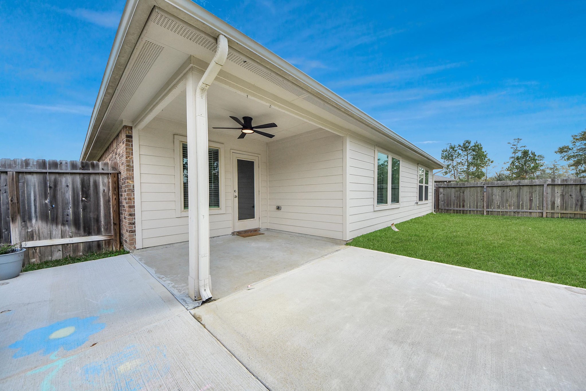 3305 Jagged Crow Lane Conroe, TX 77301 - Photo 28 of 30 a view of backyard of house and green space