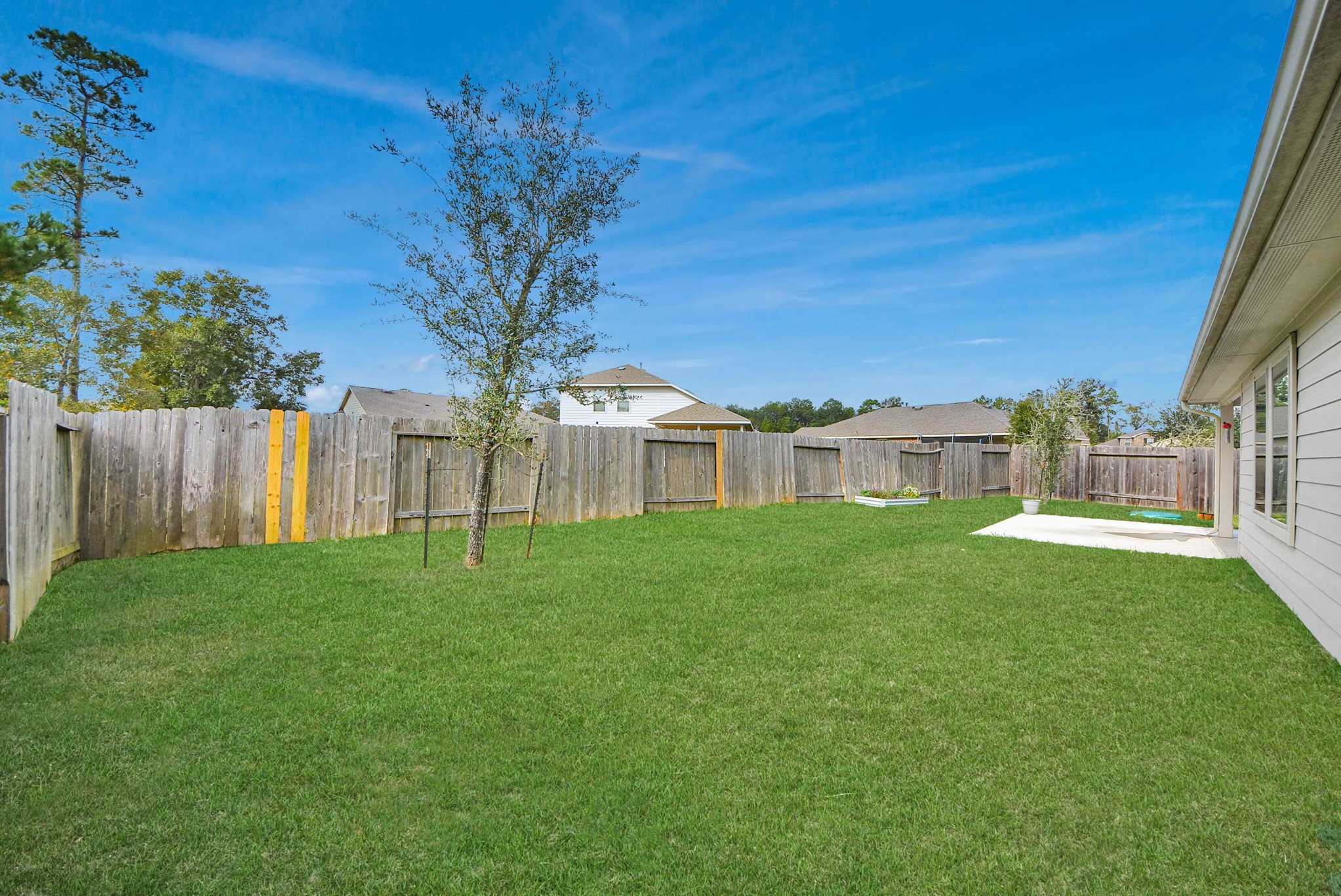 3305 Jagged Crow Lane Conroe, TX 77301 - Photo 30 of 30 a view of a garden with a house
