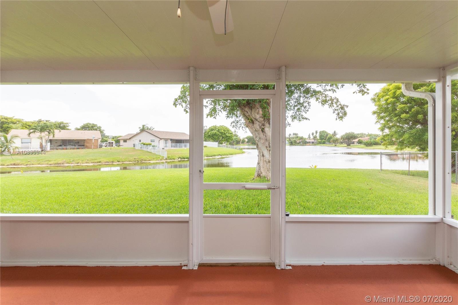 9254 Gettysburg Road Boca Raton, FL 33434 - Photo 43 of 49 a view of an outdoor space and a window