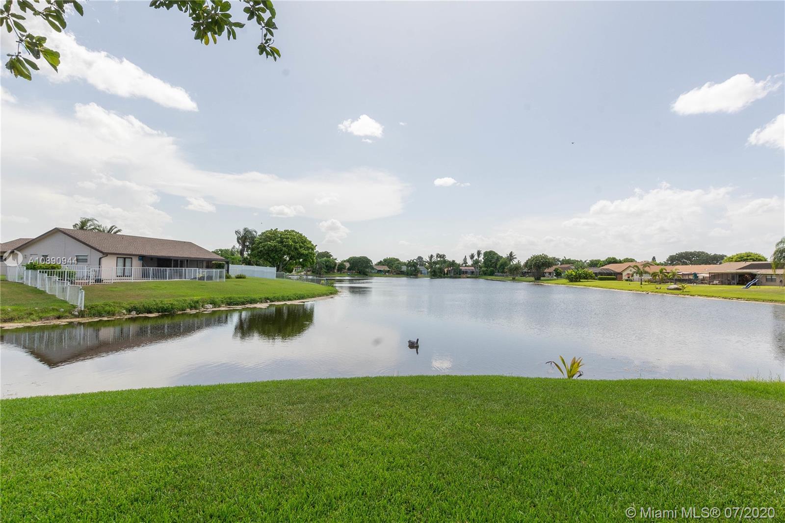 9254 Gettysburg Road Boca Raton, FL 33434 - Photo 49 of 49 a view of a lake with a city