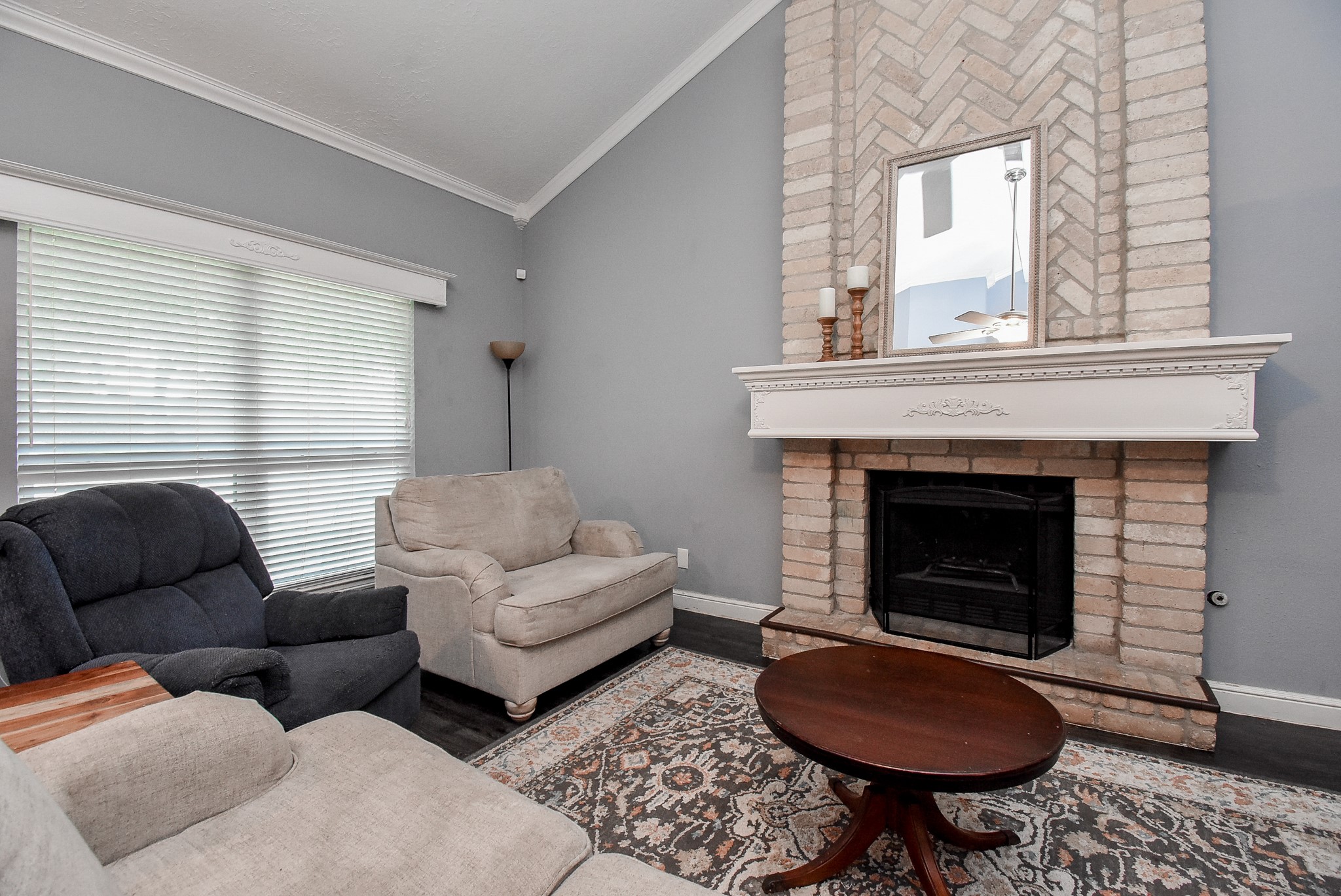 5911 Butterfly Circle Pasadena, TX 77505 - Photo 11 of 45 a living room with furniture a window and a fireplace