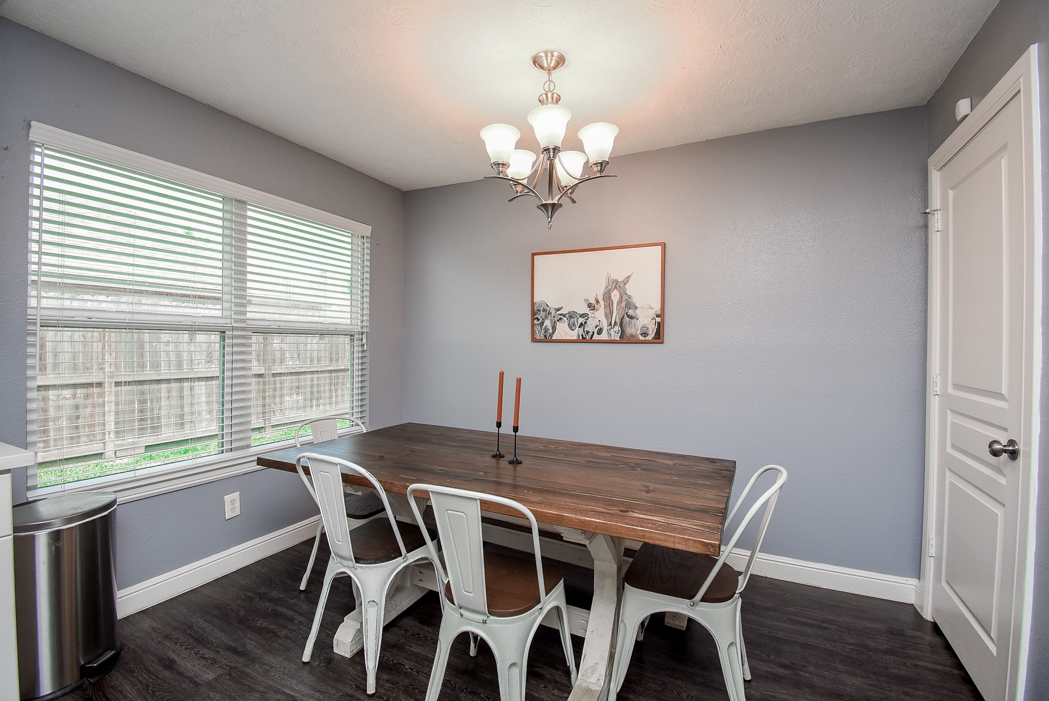 5911 Butterfly Circle Pasadena, TX 77505 - Photo 19 of 45 a view of a dining room with furniture window and wooden floor