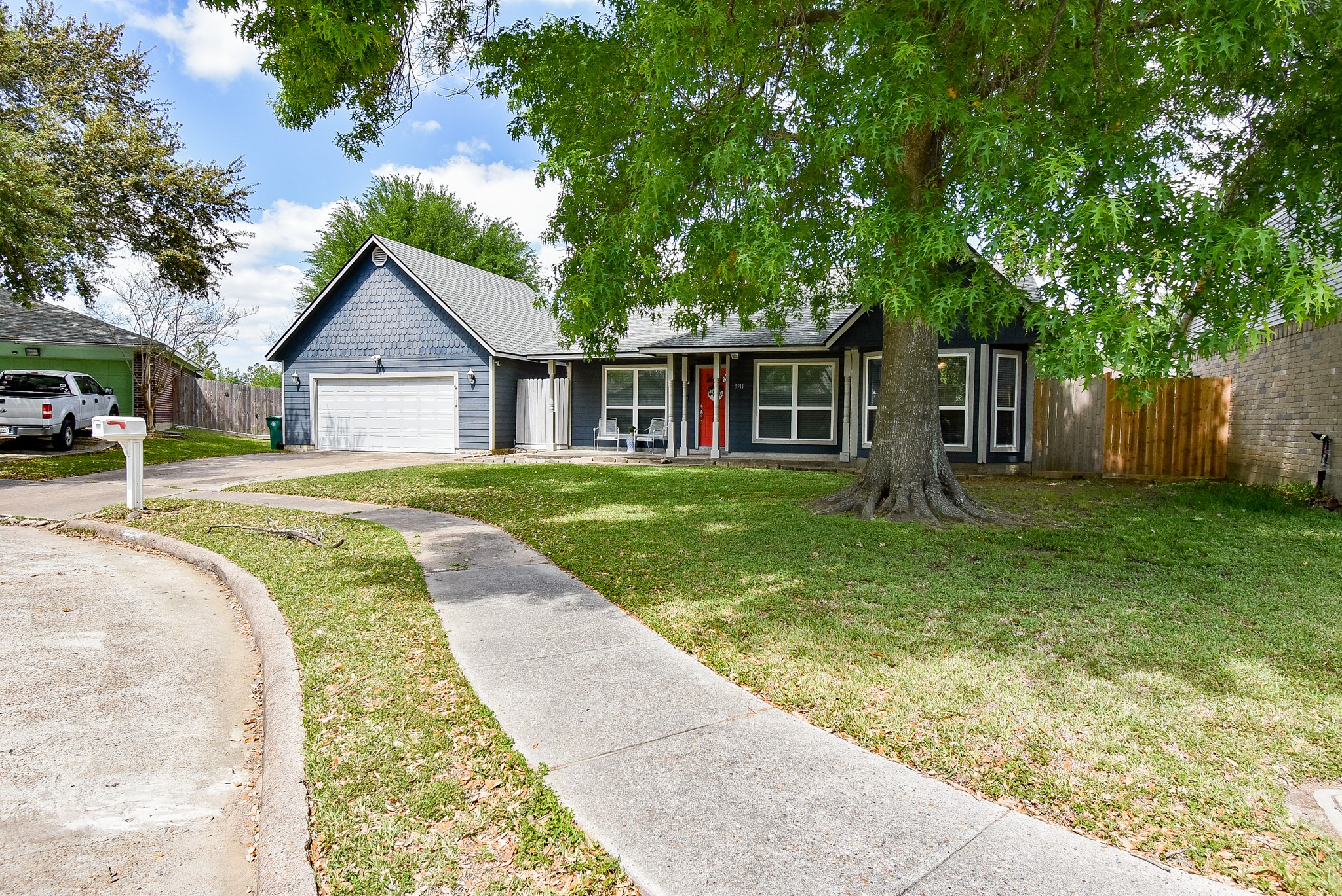 5911 Butterfly Circle Pasadena, TX 77505 - Photo 2 of 45 front view of a house with a yard