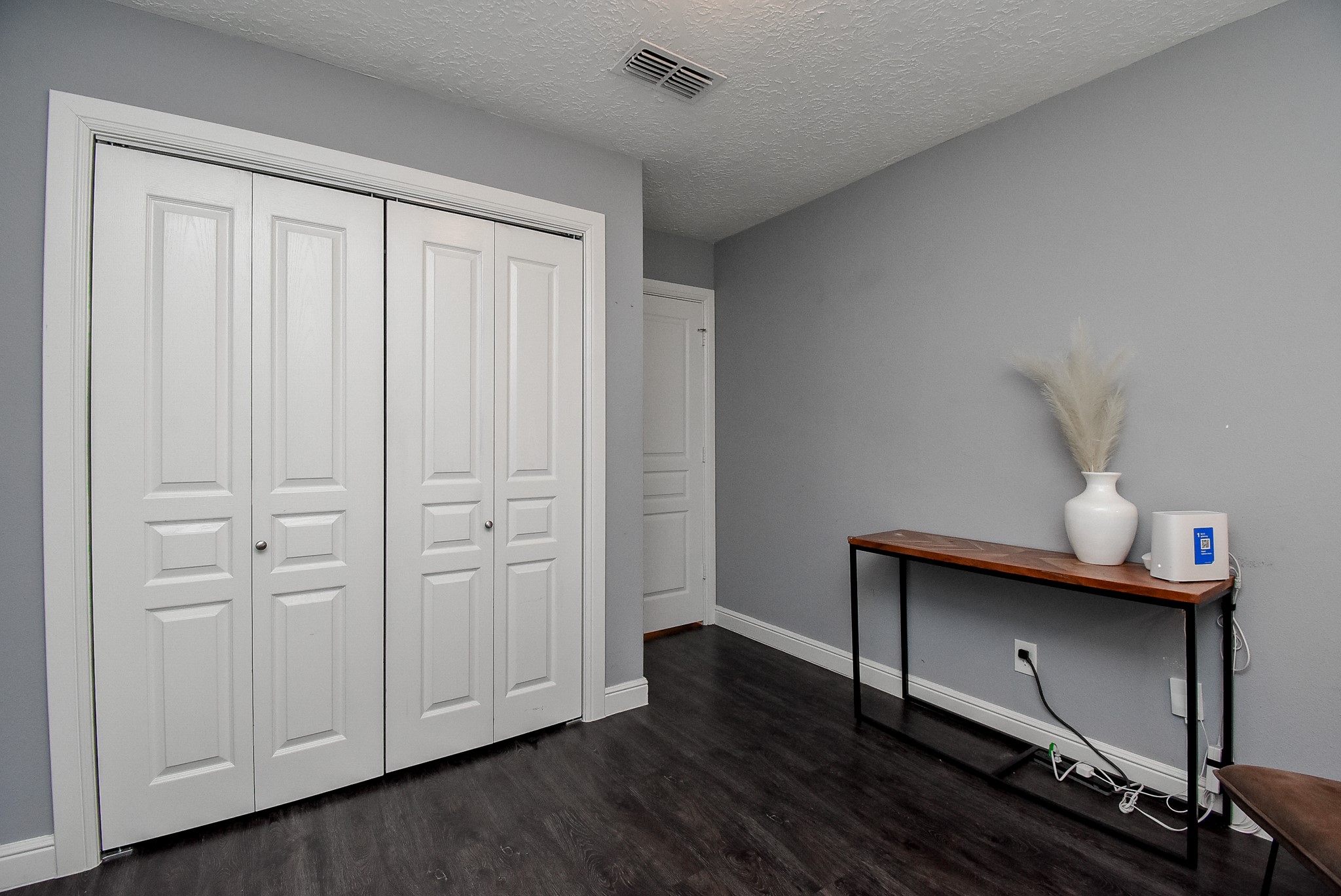 5911 Butterfly Circle Pasadena, TX 77505 - Photo 31 of 45 a view of an empty room with wooden floor