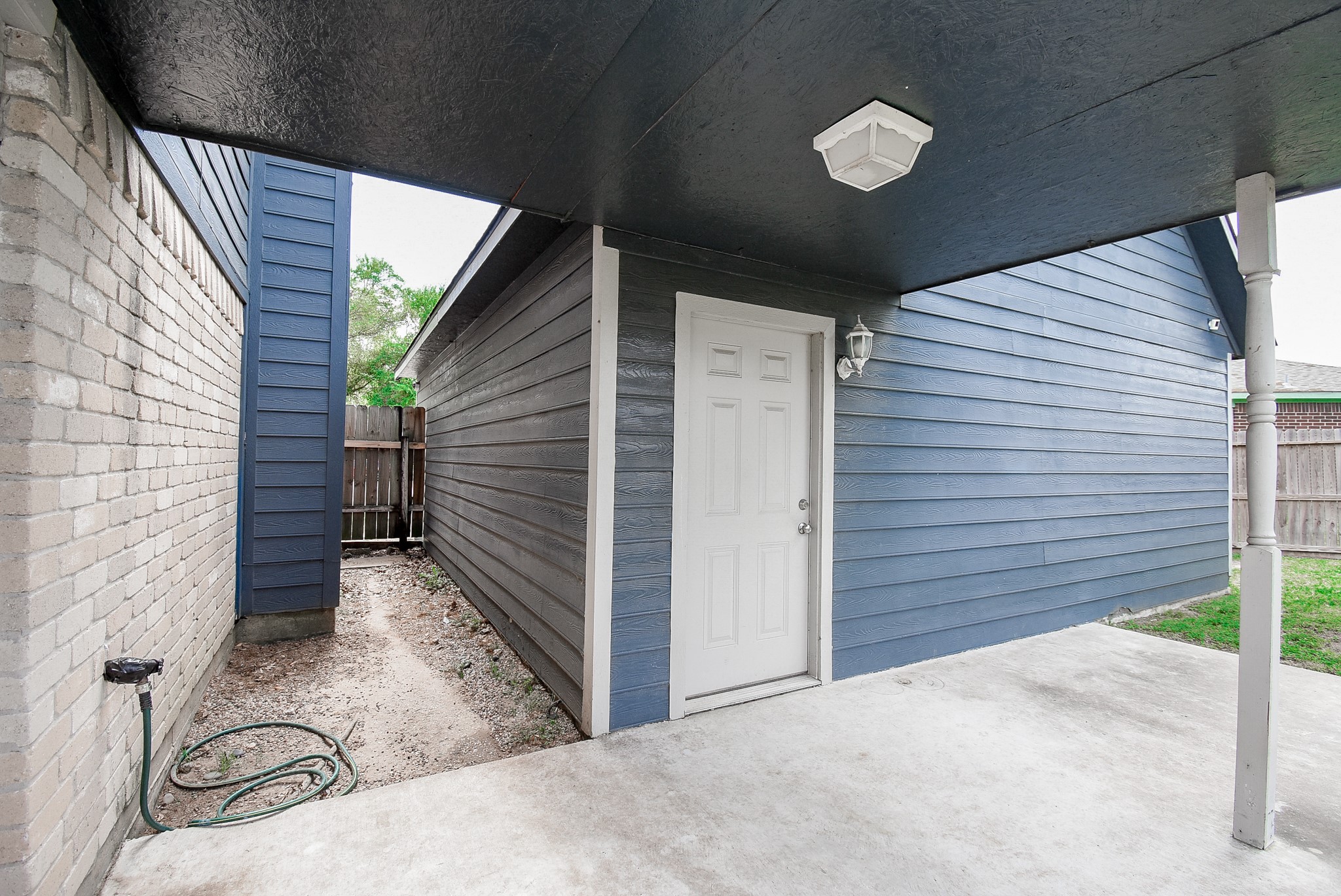 5911 Butterfly Circle Pasadena, TX 77505 - Photo 36 of 45 Backyard between the house and garage