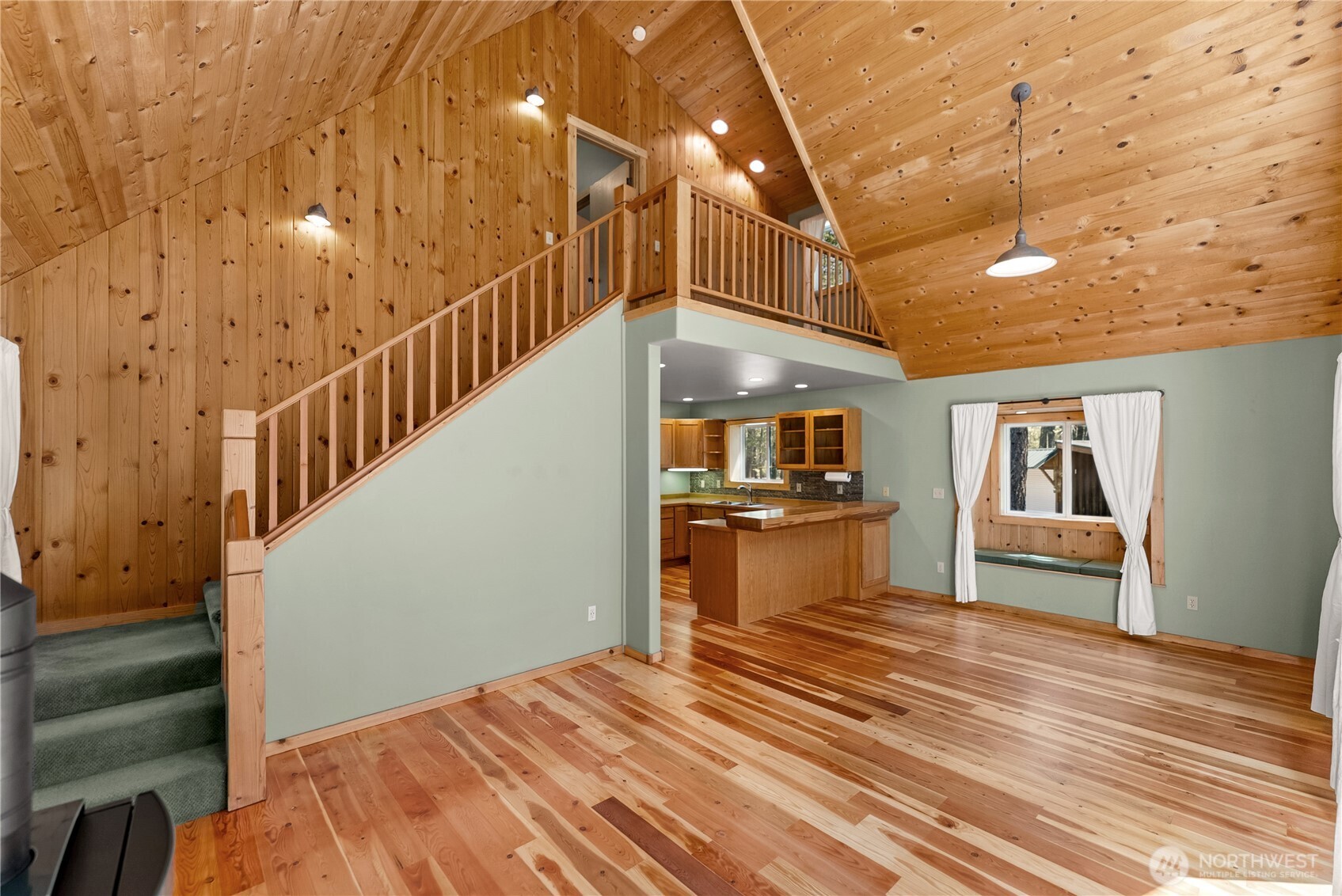 651 Lost River Road Mazama, WA 98833 - Photo 13 of 38 a view of a room with wooden floor