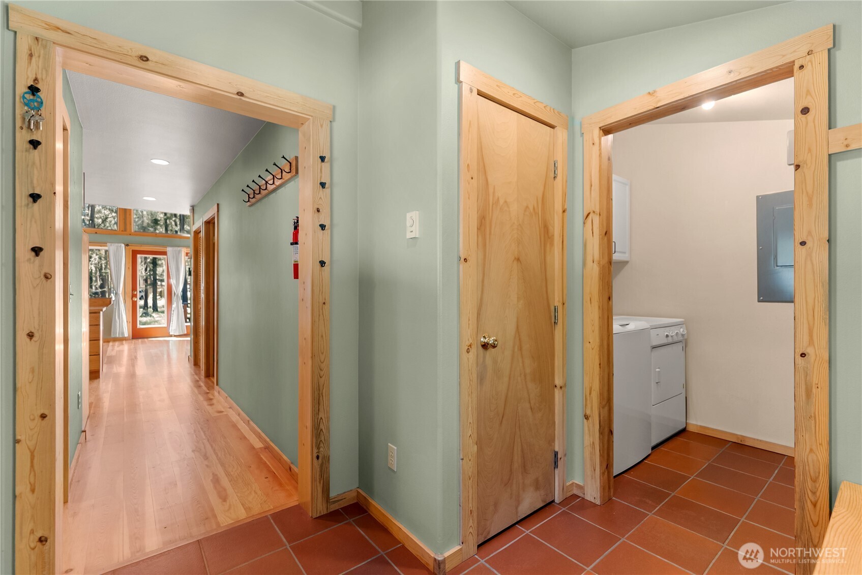 651 Lost River Road Mazama, WA 98833 - Photo 29 of 38 a view of a hallway with wooden floor