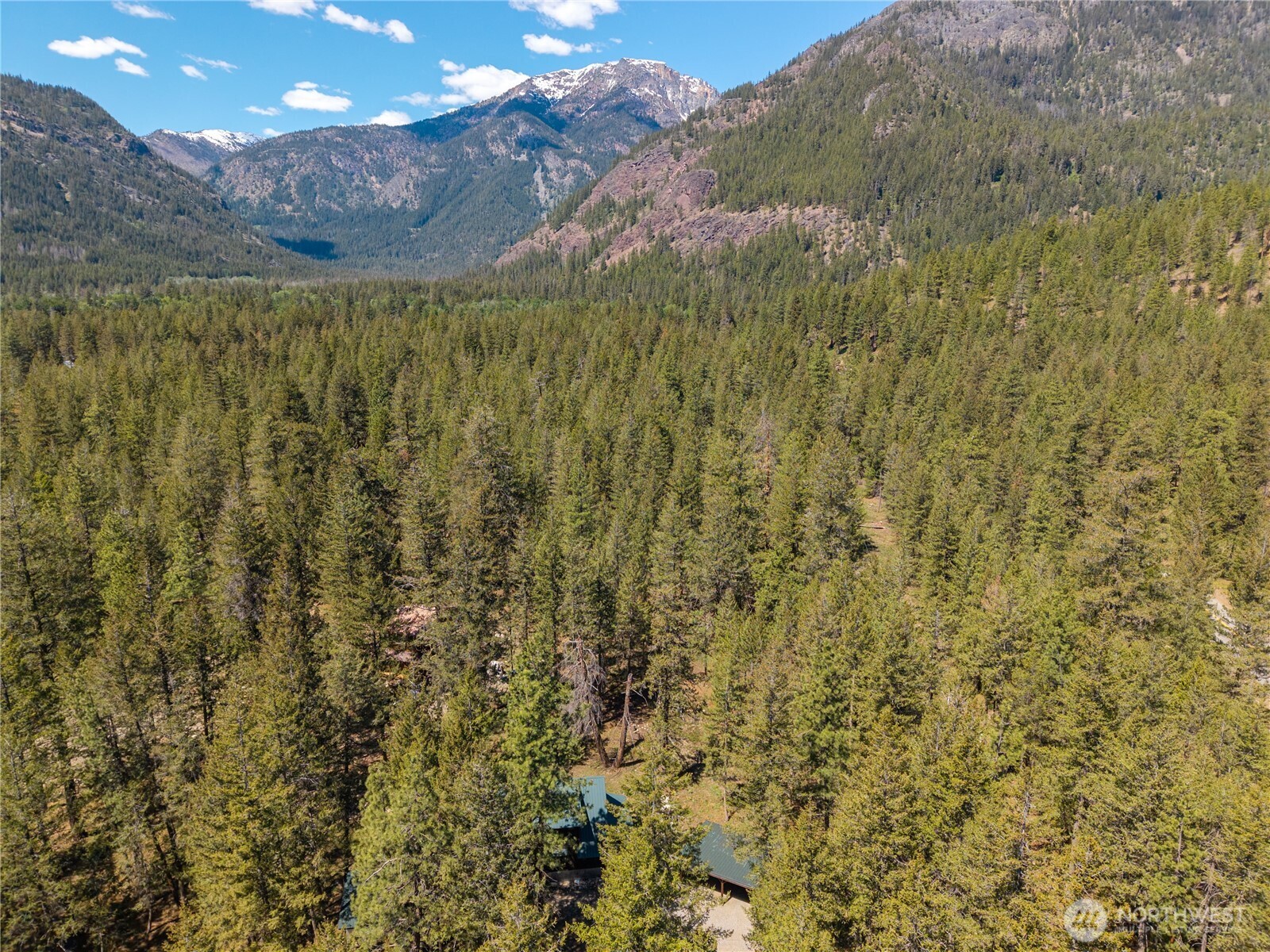 651 Lost River Road Mazama, WA 98833 - Photo 31 of 38 a view of a yard with an outdoor space