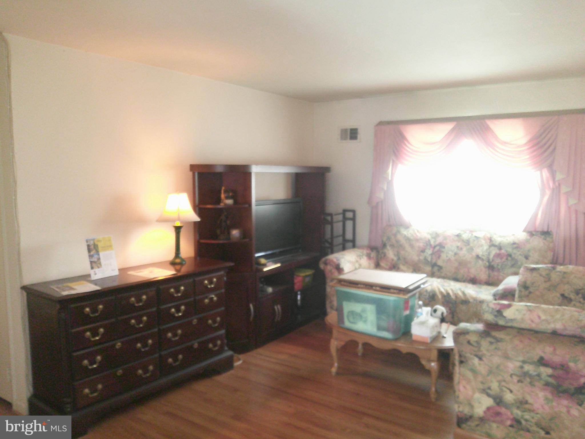 12300 Downer Drive Silver Spring, MD 20906 - Photo 20 of 53 a bedroom with a bed and a dresser